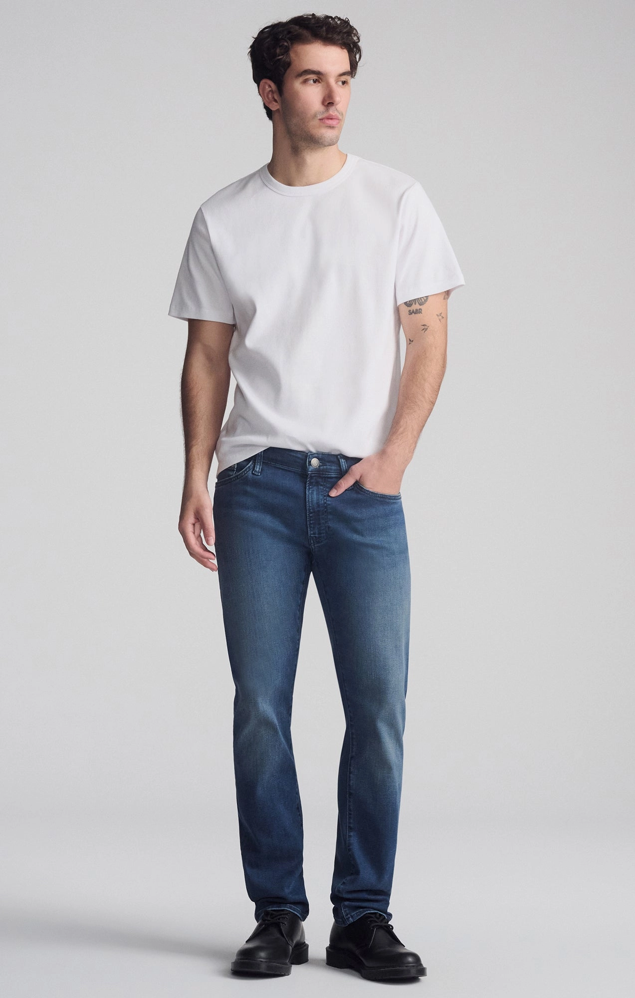 JAKE SLIM LEG IN DARK USED SUPERMOVE