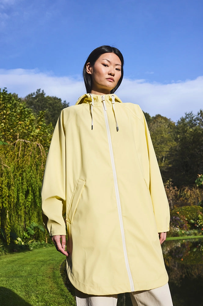 Tantä Sky Pale Banana Raincoat