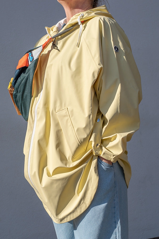 Tantä Sky Pale Banana Raincoat