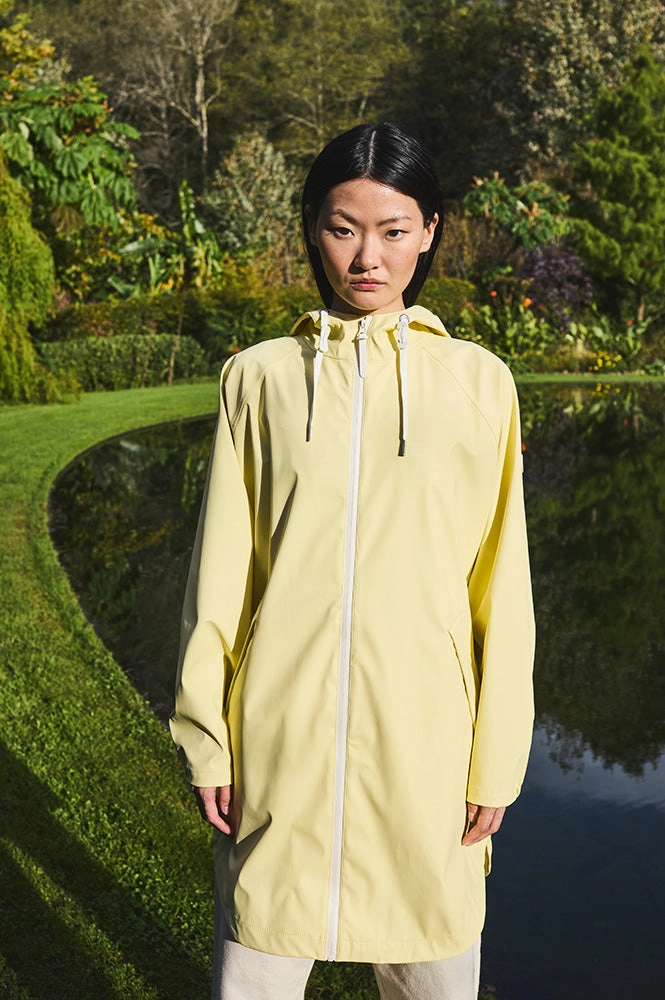 Tantä Sky Pale Banana Raincoat