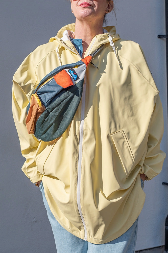 Tantä Sky Pale Banana Raincoat