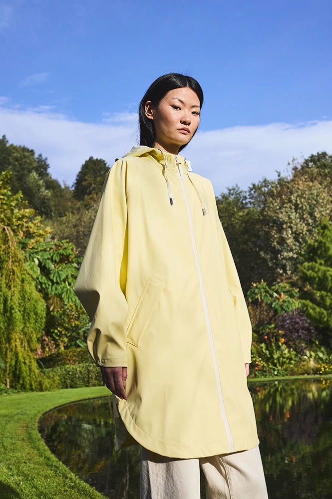 Tantä Sky Pale Banana Raincoat